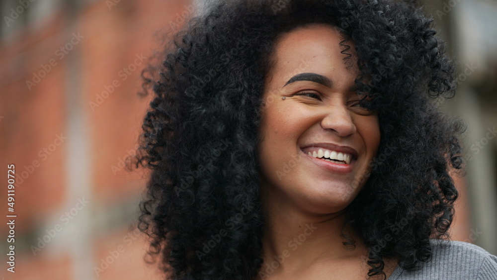 A Happy black woman laughing and smiling a happy African person real life laugh and smile A Happy black woman laughing and smiling a happy African person real life laugh and smile