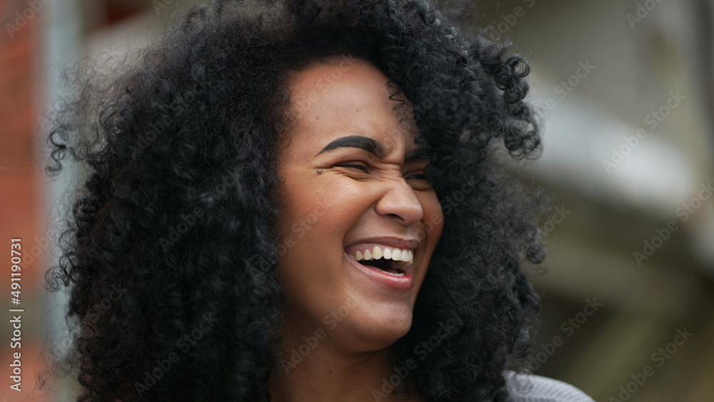 A Happy black woman laughing and smiling a happy African person real life laugh and smile A Happy black woman laughing and smiling a happy African person real life laugh and smile