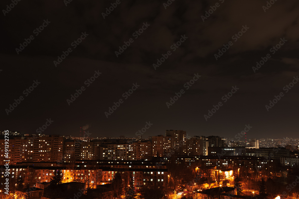 Night view photo of the city and its nightlife lights, from the window.