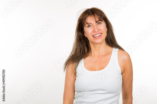 portrait senior woman posing smiling looking at camera on white background