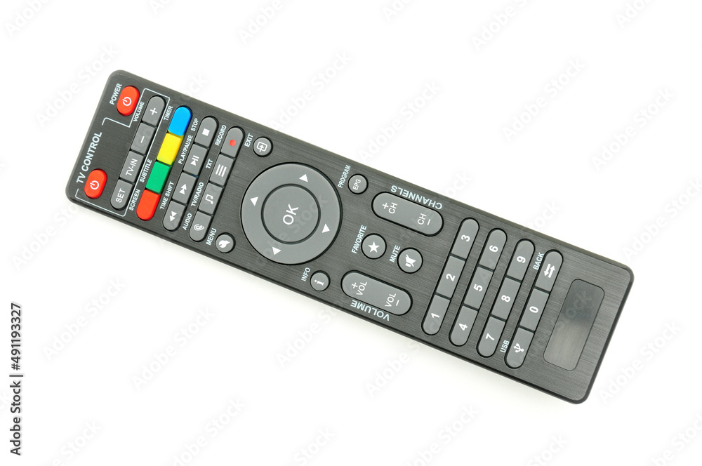Remote control for digital TV tuners, music players, and disk drives on a white background Remote control for digital TV tuners, music players, and disk drives on a white background