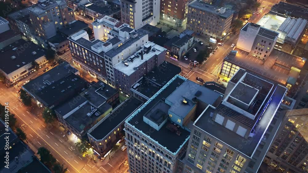 Aerial view of Downtown Vancouver skyline and traffic from a city rooftop at night