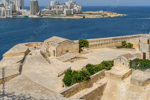Saint Andrew's Bastion in Valletta, Malta, overlooking Marsamxett Harbour and the apartments and fort at Tigne Point, Sliema. photo