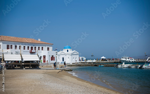 Cycladic architecture amazing panoramic views of the Aegean sea, visit Mykonos Little Venice or Mykonos Town’s historic experience ancient history, different flavors, and relaxation © Damian