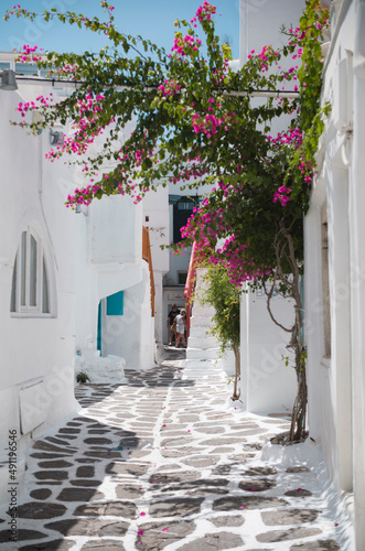 Leinwand Poster Sightings of Mykonos Island in Greece are of vivid whitewashed houses with vibra