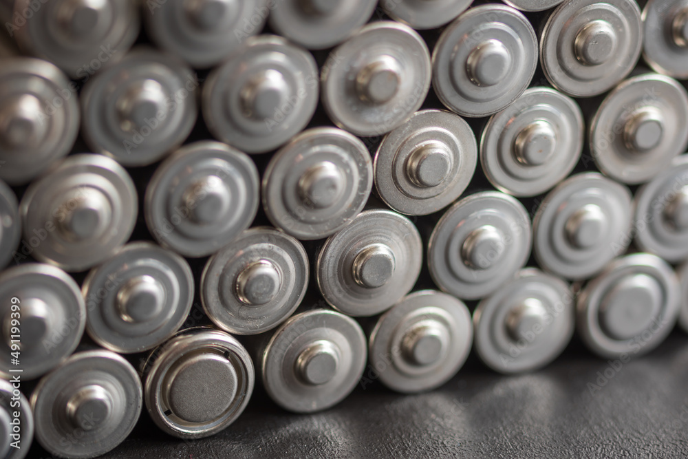 AA batteries background closeup view AA batteries background closeup view