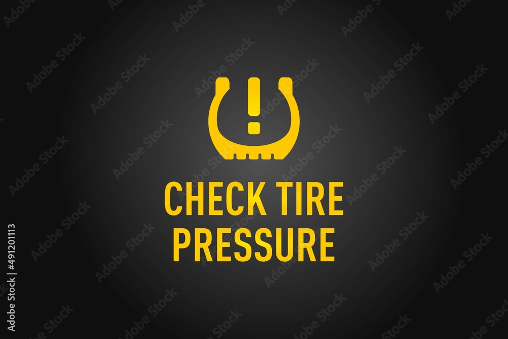 Check Tire Pressure warning on a black background