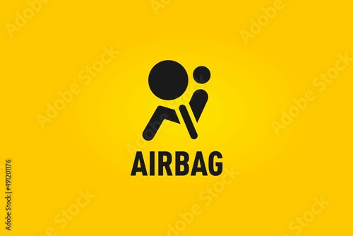 Black airbag icon and text on a yellow background photo