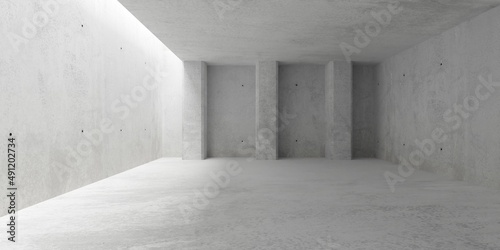 Abstract empty, modern concrete walls room with top light from left opening and pillars recess on back wall - industrial interior background template
