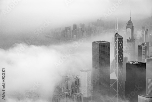 Skyscraper in downtown of Hong Kong city in fog