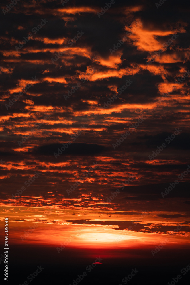 nature sunset landscape scene view, panorama natural view for using in background or concept of environmental and sustainable development, The sun downing over the cloud sky and local mountain land