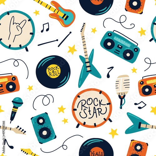 Retro musical rock instruments seamless pattern. Hand drawn colorful illustrations of guitars, drums, tape recorders in simple doodle cartoon childish style. for baby textiles, wallpaper, wrapping.