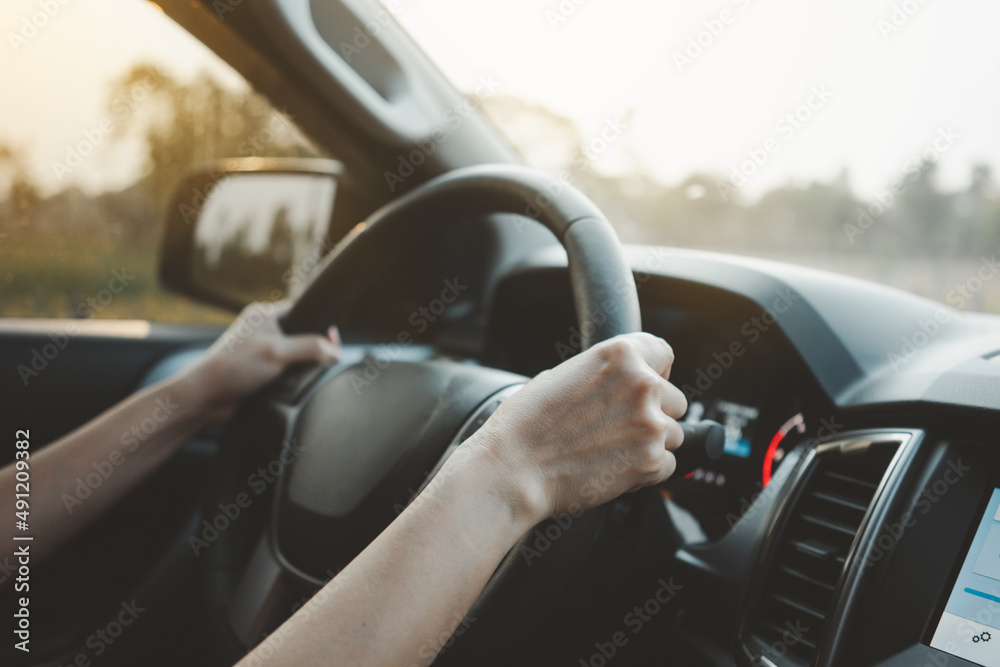 Woman driving a car.