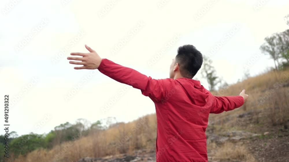 Smart trail runner man on rocky mountain. Smart athlete jog, exercising outdoor for healthy. Confident and powerful marathon man workout and cardio . Sport and Lifestyle concept. Smart trail runner man on rocky mountain. Smart athlete jog, exercising outdoor for healthy. Confident and powerful marathon man workout and cardio . Sport and Lifestyle concept.