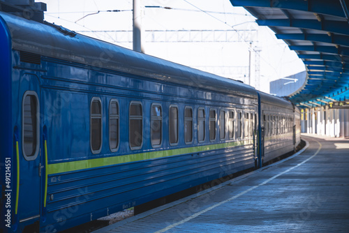 Central railway passenger station of the city of Dnepr. Ukrainian railway. The electric train stands on the platform of the main station, waiting for departure to the route