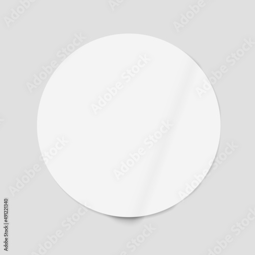 Vector folded round adhesive paper sticker with shadow on transparent background.