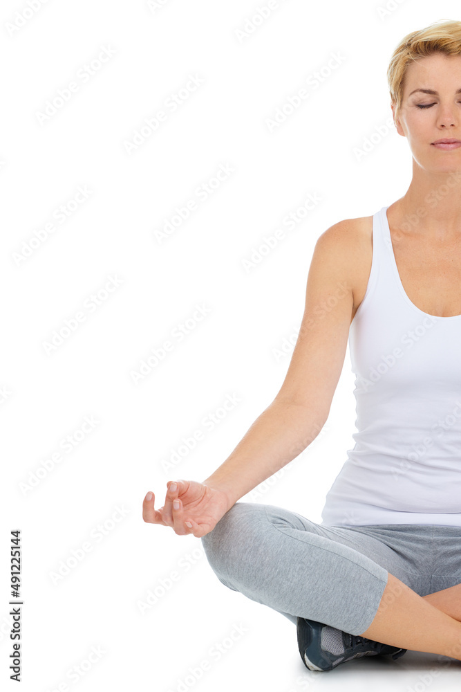 She promotes exercise and healthy eating. Cropped shot of a sporty young woman isolated on white.