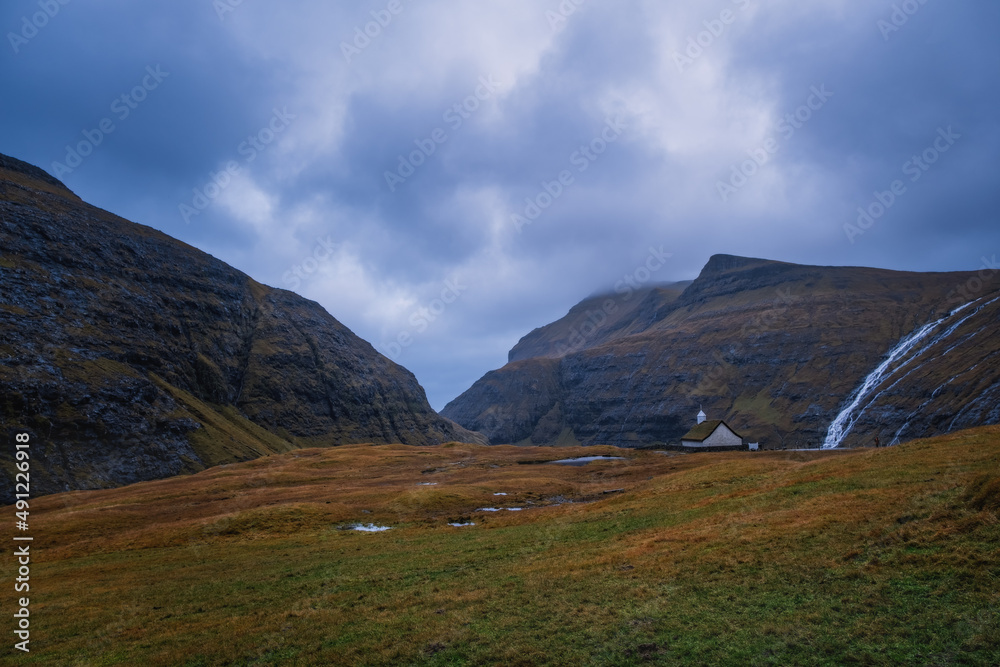 Dramatic november landscape. View of Saksun church, Faroe Islands. Splendid morning scene of Streymoy island, Denmark, Europe. 2021