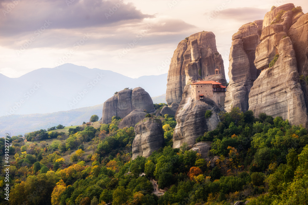 Holy Monastery of Saint Nicholas Anapafsas on a rock cliff at Meteora. Travel and pilgrim must visit places in Greece