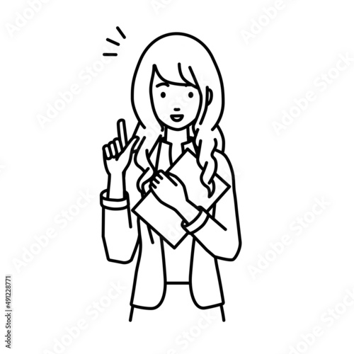 立って書類を手に持って何かひらめいたジャケットの女性