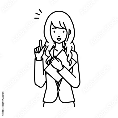 立って書類を手に持って何かひらめいたスーツの女性