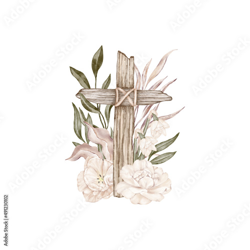 Wooden cross among flowers and leaves