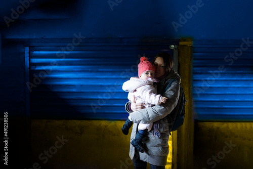 A mother and her small child in the air raid shelter photo