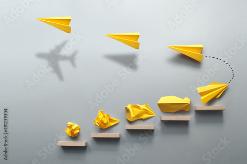 Paper airplane success concept