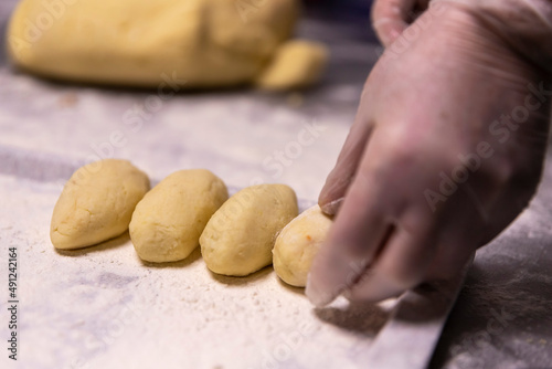 hands with dough