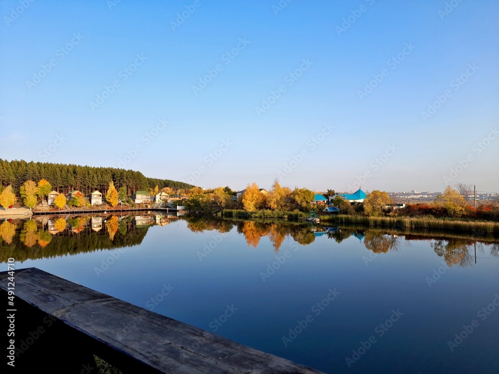 Fototapeta premium view from the villa by the lake on the autumn landscape