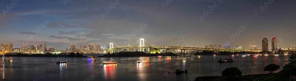 Japan, Kanto Region, Tokyo, Long exposure of Tokyo Bay at dusk with Rainbow Bridge in background Japan, Kanto Region, Tokyo, Long exposure of Tokyo Bay at dusk with Rainbow Bridge in background