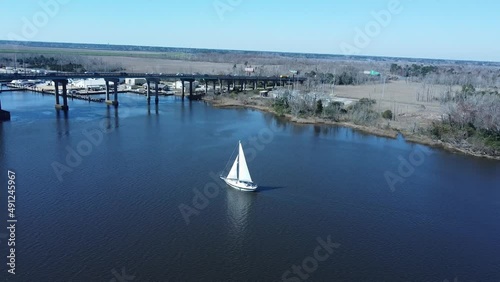 Wallpaper Mural Aerial view of sailboat on Cape Fear River in Wilmington, NC heading to Atlantic Ocean Torontodigital.ca
