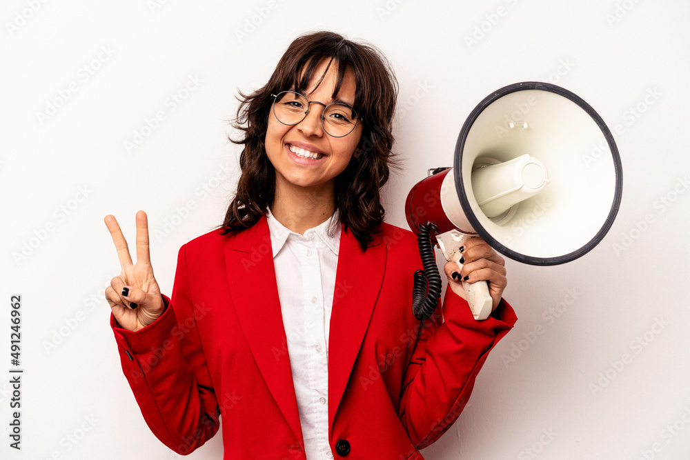 Young business hispanic woman holding an megaphone isolated on white background showing number two with fingers. Young business hispanic woman holding an megaphone isolated on white background showing number two with fingers.