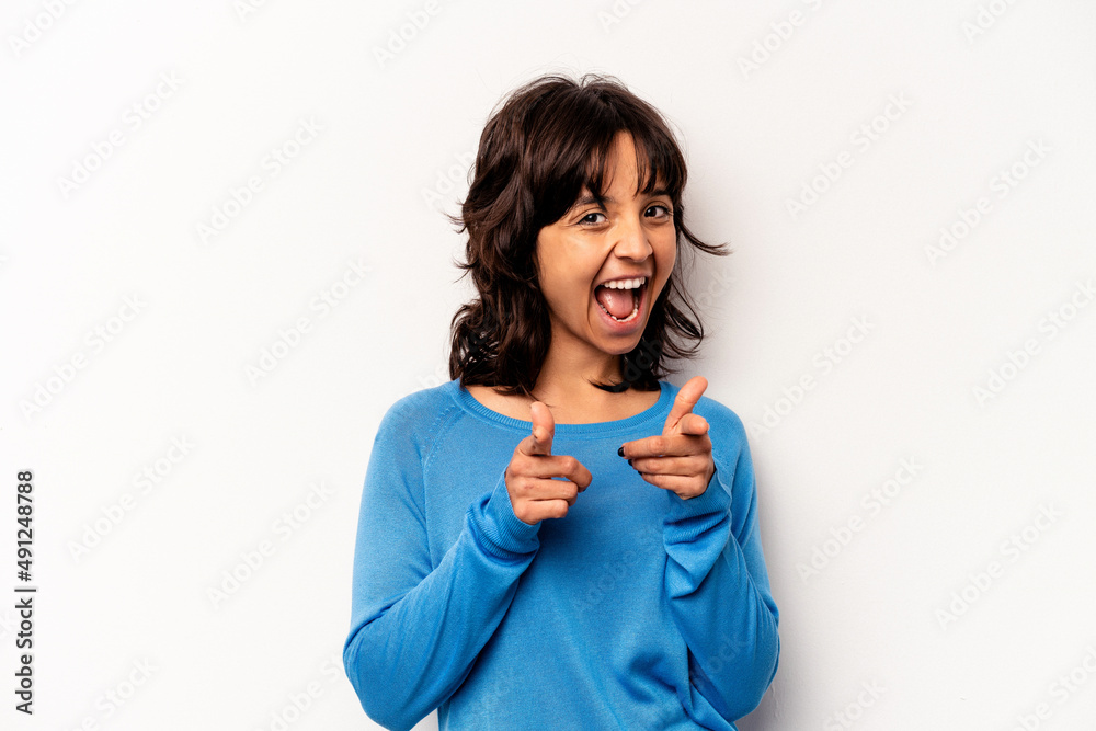 Young hispanic woman isolated on white background cheerful smiles pointing to front. Young hispanic woman isolated on white background cheerful smiles pointing to front.