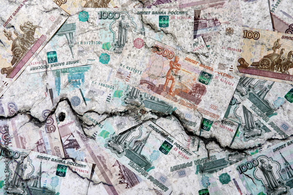 Fototapeta premium The concept of the ruble depreciating due to the Russian invasion in March 2022.