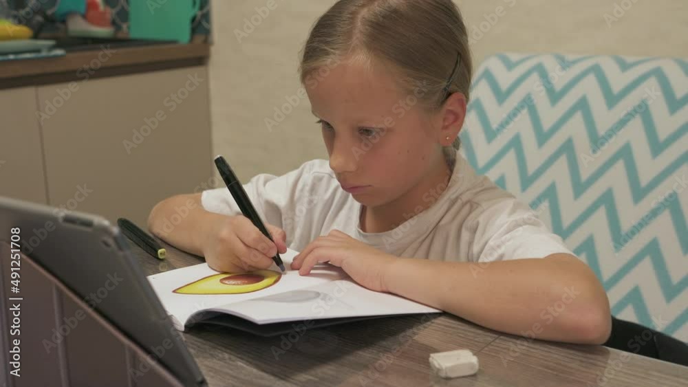 ten year old girl learns to draw online using internet and tablet ten year old girl learns to draw online using internet and tablet