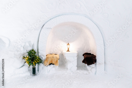Interior of igloo with dining area in alcove photo