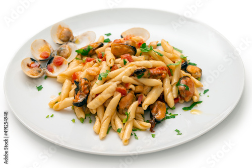 Piatto di deliziose trofie artigianali con salsa di frutti di mare, Pasta Italiana  photo