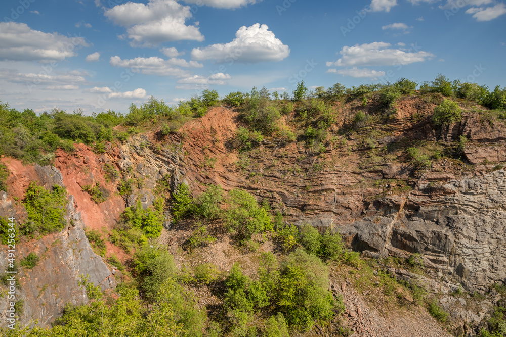 red colored rocks under the blue sky