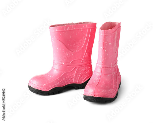 Pink rubber boots isolated