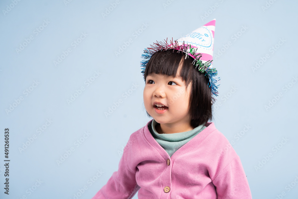 lovely baby girl portrait, isolated on blue background lovely baby girl portrait, isolated on blue background