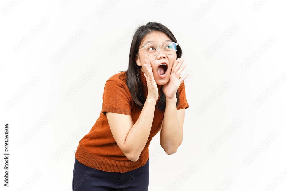 Shouting out loud with hands over mouth Of Beautiful Asian Woman Isolated On White Background Shouting out loud with hands over mouth Of Beautiful Asian Woman Isolated On White Background