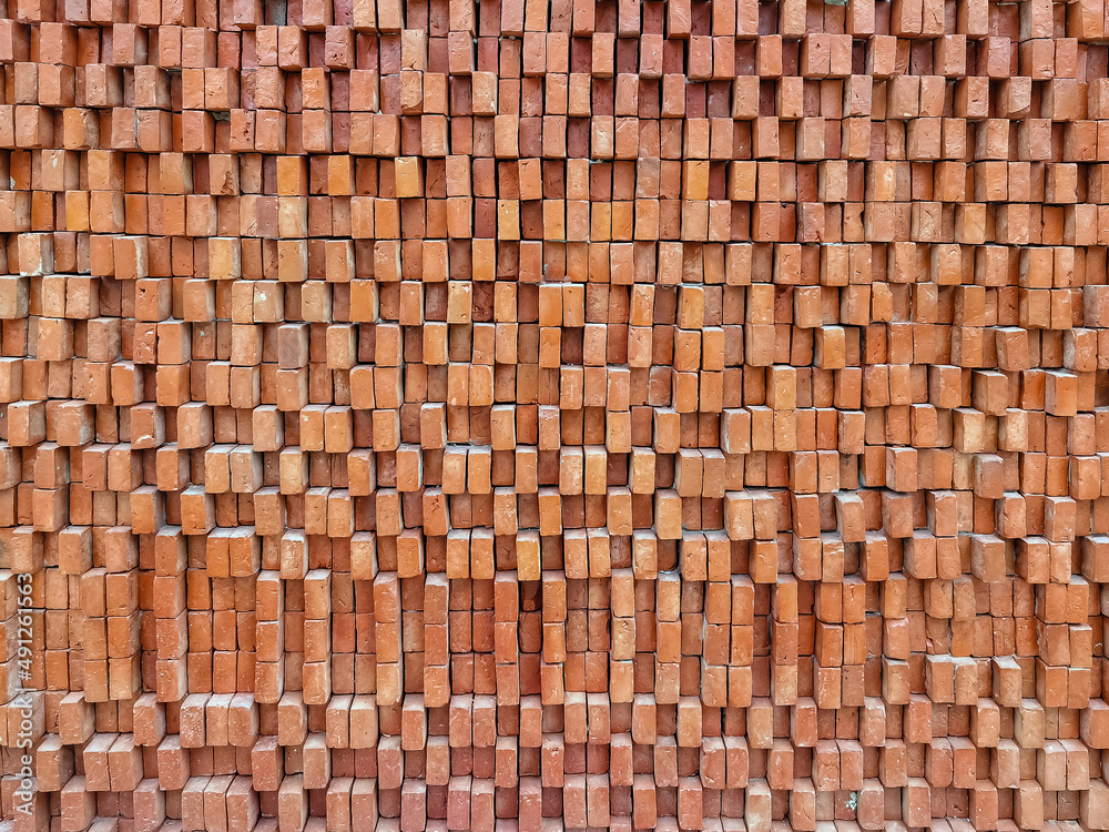 Brown brick wall. Texture of brown brick wall pattern background. Abstract wallpaper texture with old and vintage style pattern. Home or office design backdrop. Outstandingly beautiful architecture. Brown brick wall. Texture of brown brick wall pattern background. Abstract wallpaper texture with old and vintage style pattern. Home or office design backdrop. Outstandingly beautiful architecture.