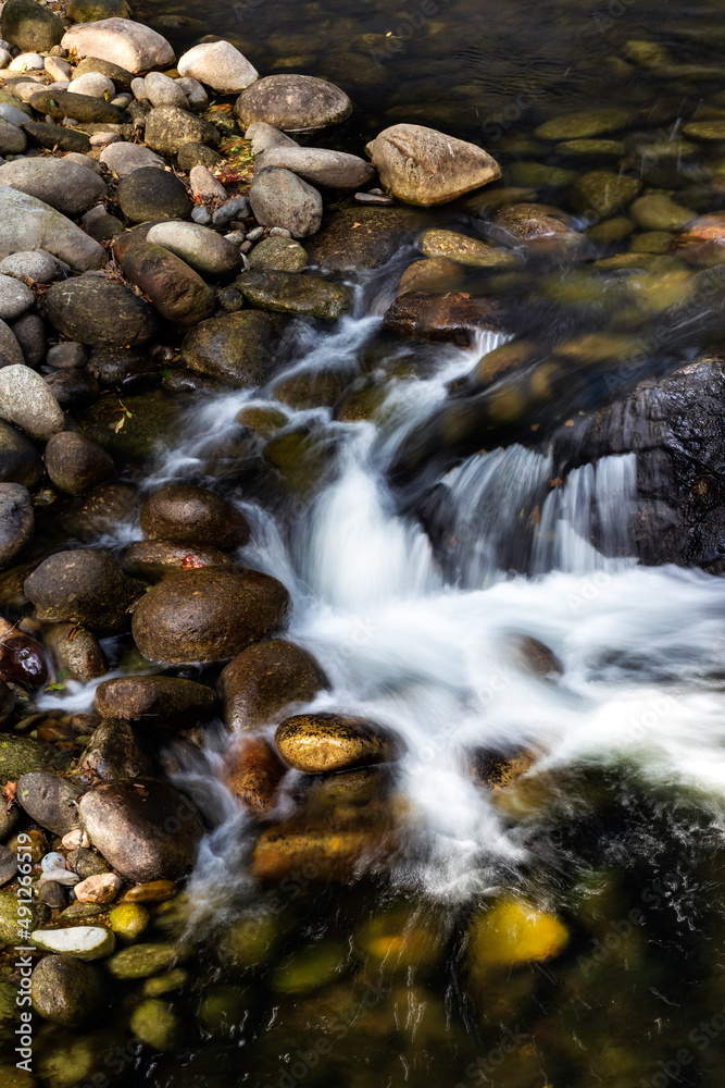 River Arenal among the pebbles in fall time.Avila. Spain. Europe. River Arenal among the pebbles in fall time.Avila. Spain. Europe.
