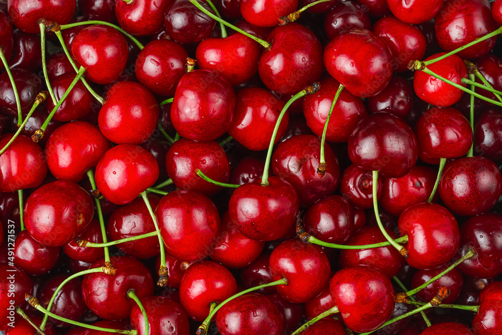 Close up background of fresh sweet cherries. Close up background of fresh sweet cherries.