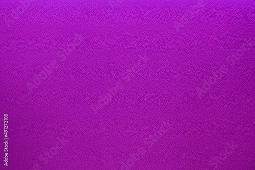 Purple leather background texture close up