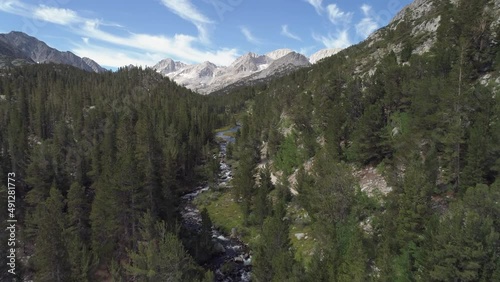 Aerial drone footage of Mountain peaks and river
