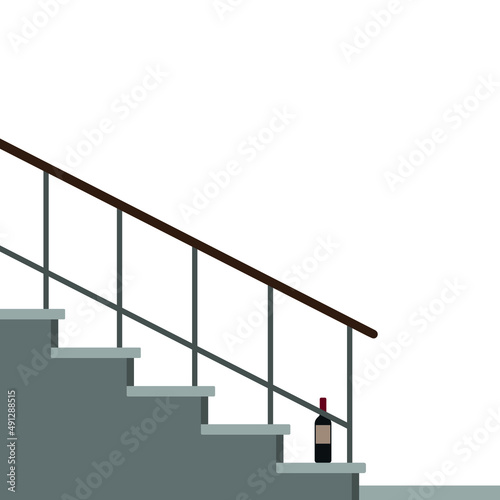 A bottle of wine stands on the bottom step of the stairs on a white background