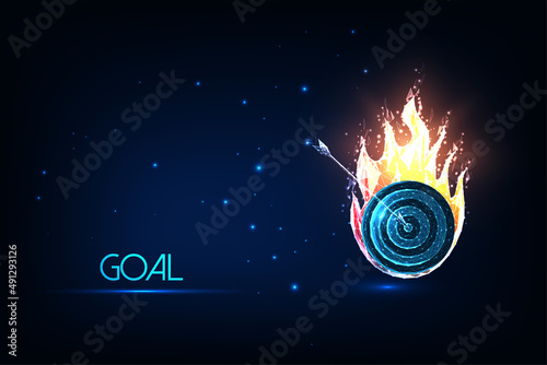 Futuristic goal concept with glowing low polygonal target with arrows burning in fire isolated on dark blue 