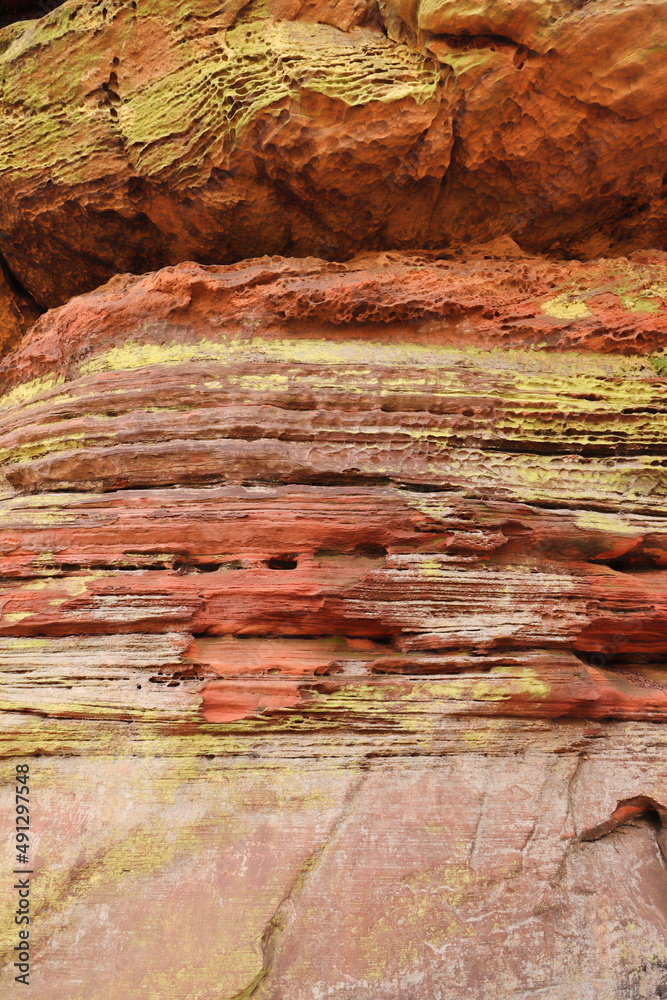 a colorful sandstone rock as background 